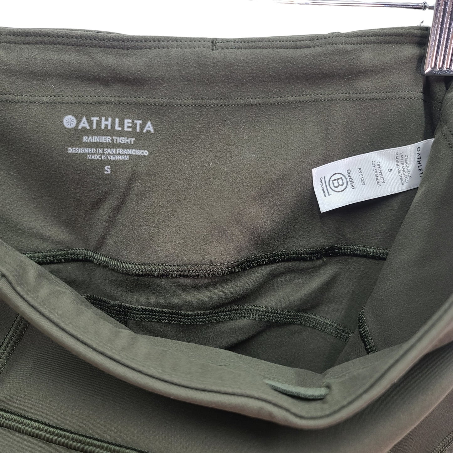 Athleta Rainer Tight Green Leggings Side Zipper Pockets Size Small